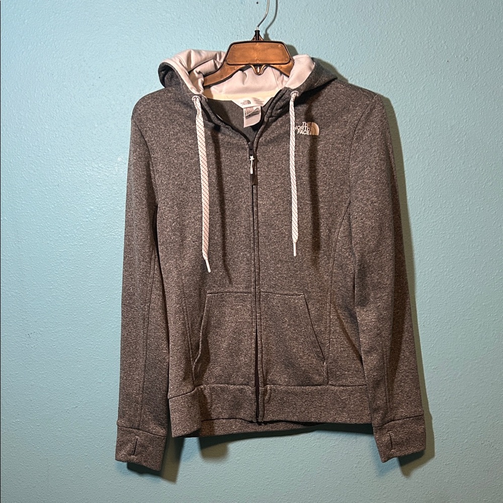 The North Face Charcoal Zip-Up Hoodie with thumb holes women’s size small.